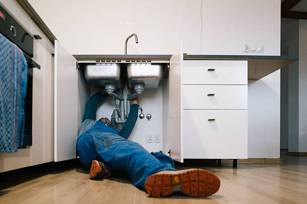 Professional Drain Cleaning technician working in Richmond Hill, NY